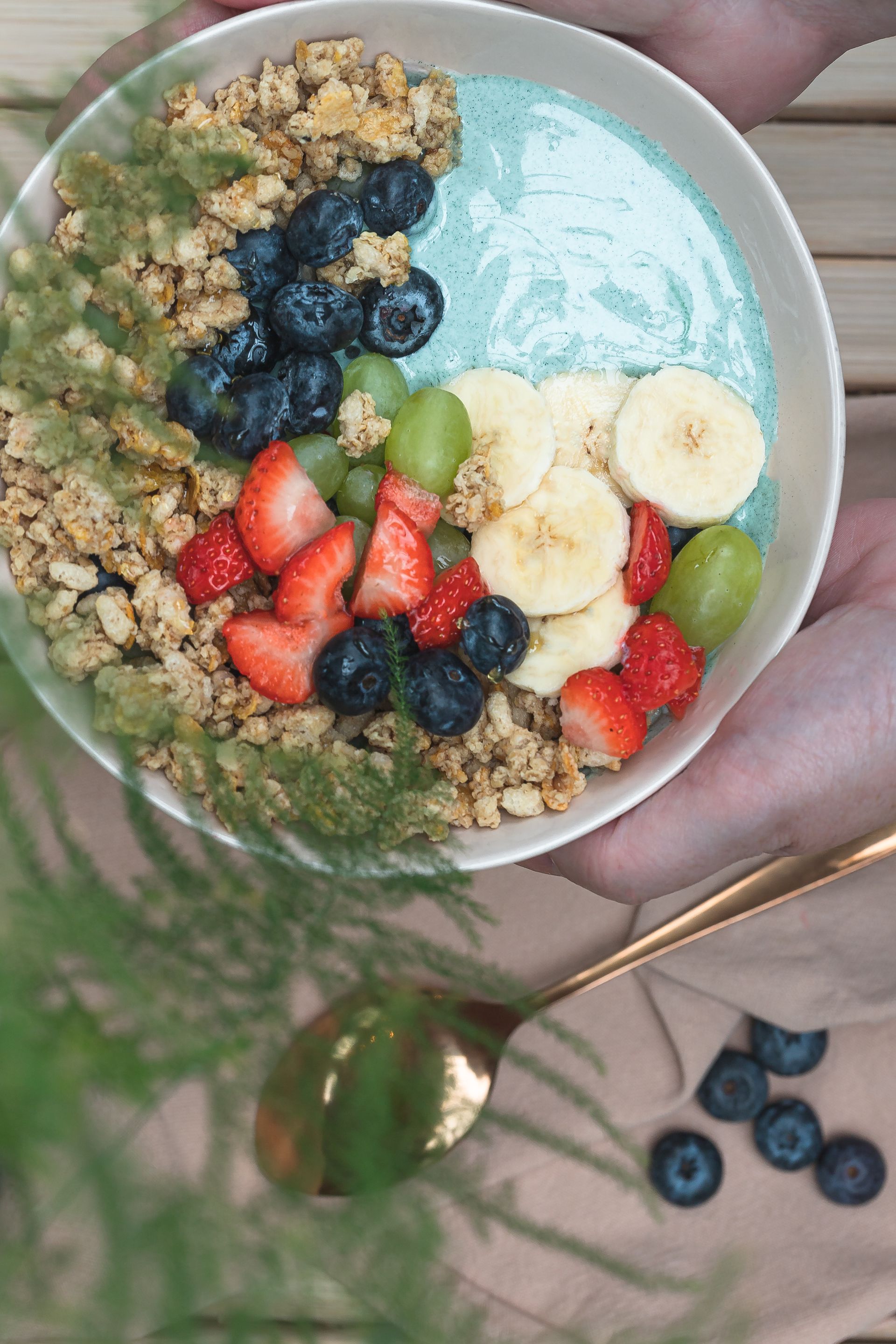 A colorful, nutrient-dense breakfast bowl with fruit and granola