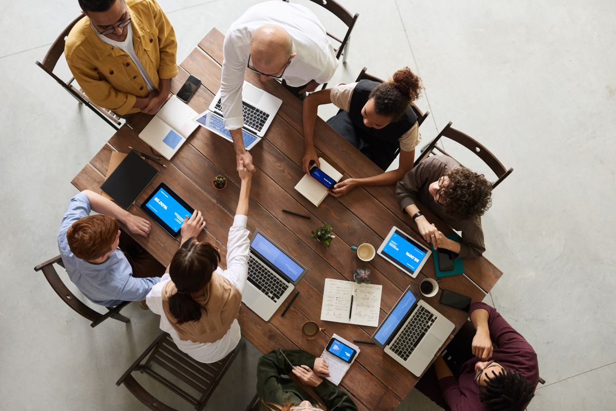 People collaborating around a table during a planning session